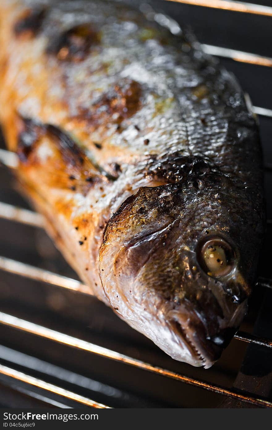 Smoked mackerel on pan closeup