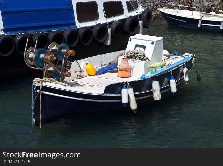 Traditional fishing boat at Santorini island in Greece. Traditional fishing boat at Santorini island in Greece