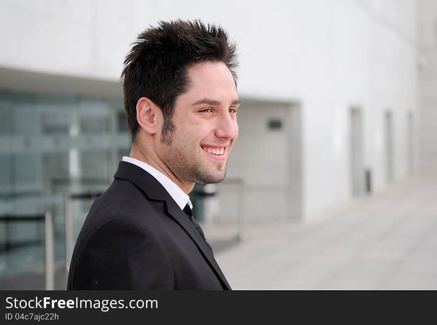 Handsome Young Businessman Laughing