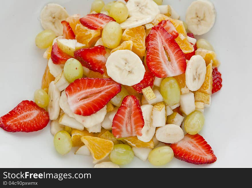 Fresh fruit salad in a white plate