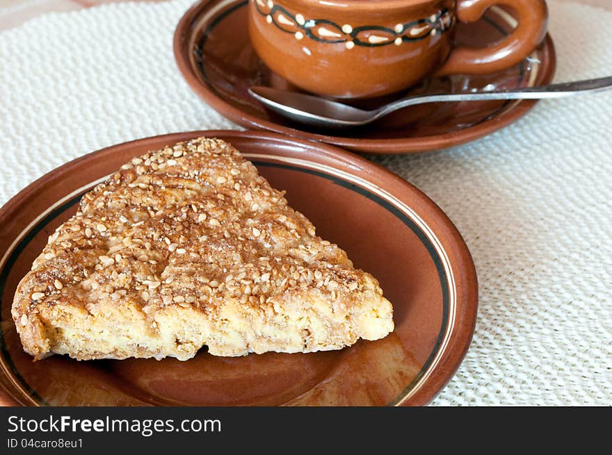 Delicious fresh baked  cake with a cup of coffee. Delicious fresh baked  cake with a cup of coffee