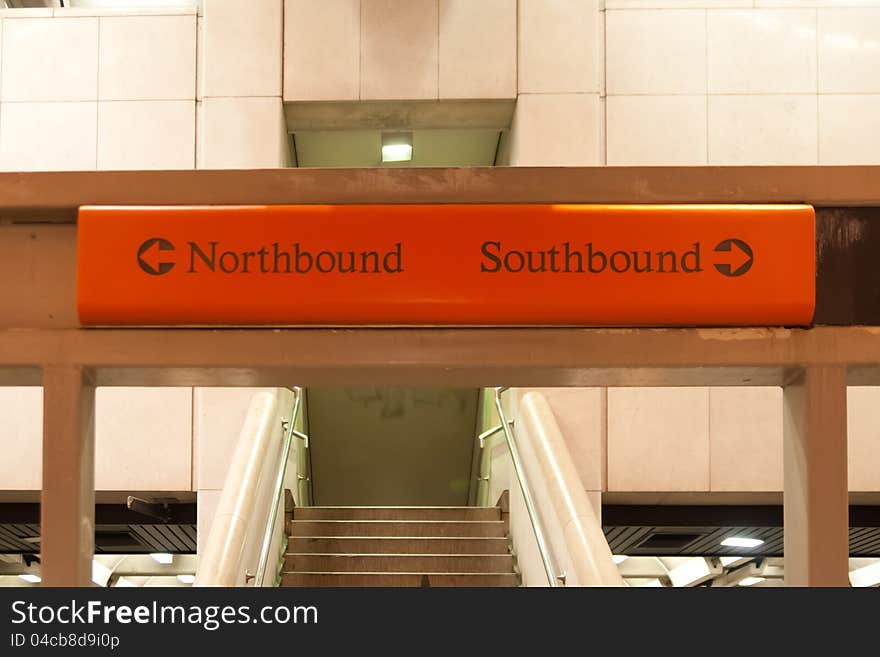 Directional Sign In A Subway