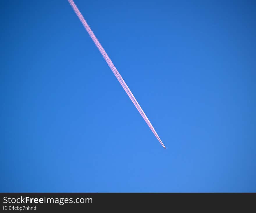 Aerial crossroad clear blue sky with crossing jets contrails. Aerial crossroad clear blue sky with crossing jets contrails