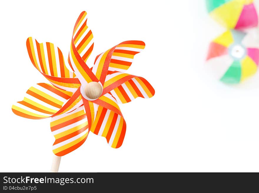 Colorful toy pinwheel on white background