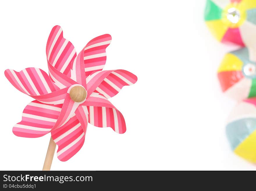 Colorful toy pinwheel on white background