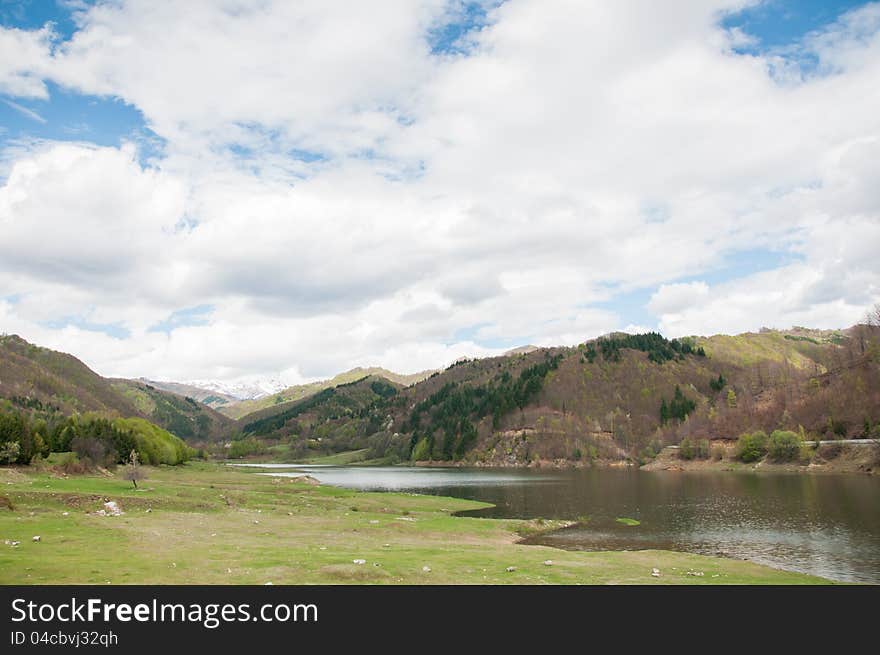 Beautiful nature inside a national park in Romania with mountain lake. Beautiful nature inside a national park in Romania with mountain lake