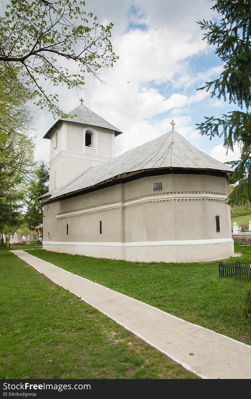 Small stone orthodox church in rural Romania