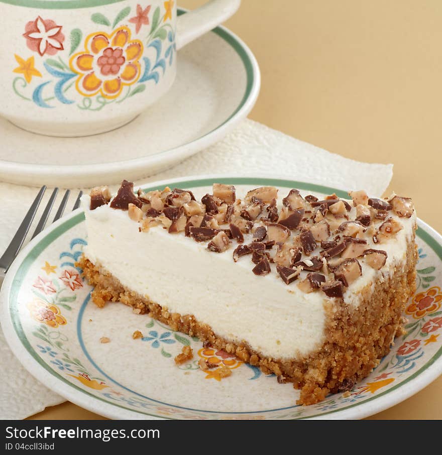 Piece of cheesecake with graham cracker crust. Piece of cheesecake with graham cracker crust