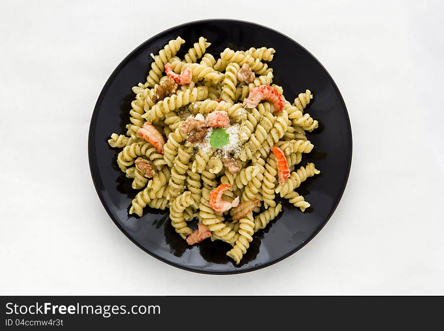 Pasta with pesto, parmesan and crab tails