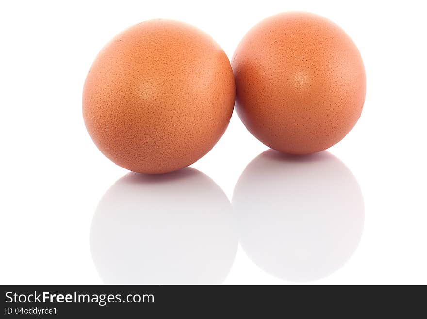 Two chicken eggs  on white background.