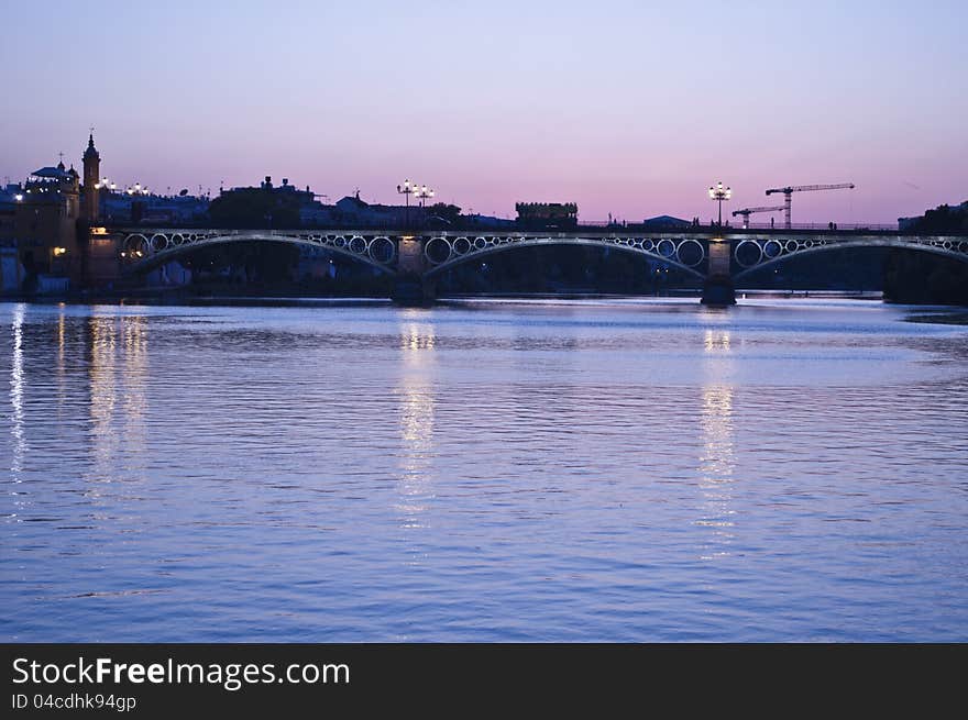 Bridge and river at night