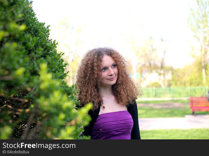 Portrait of a smiling girl glowing in the sun. Portrait of a smiling girl glowing in the sun