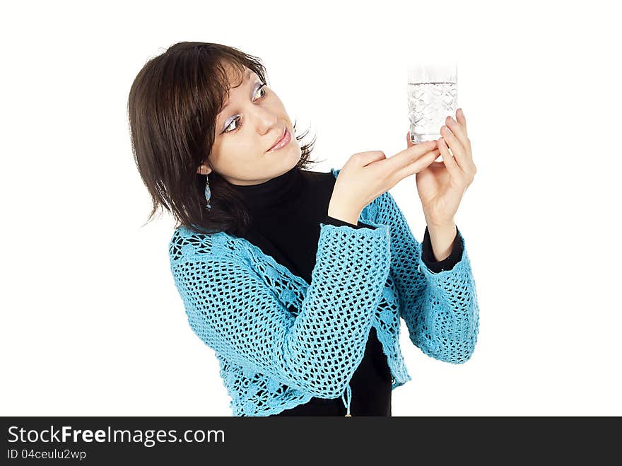 Girl is considering a glass of water