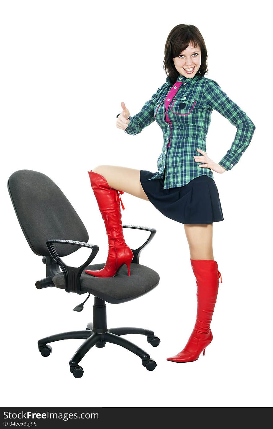 Beautiful girl with a computer chair indicates the sign of good