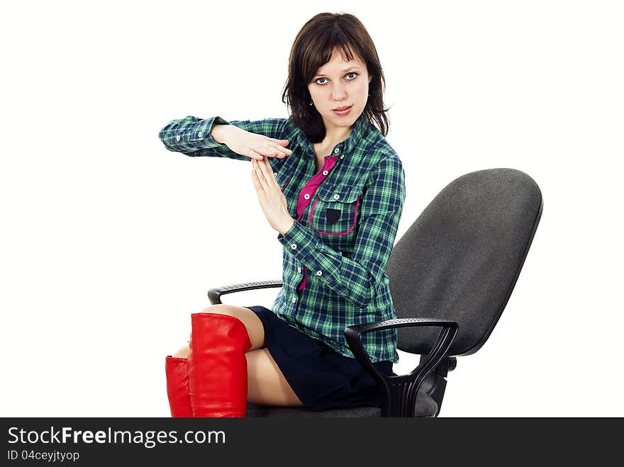 Beautiful girl on a chair indicates time out. Beautiful girl on a chair indicates time out