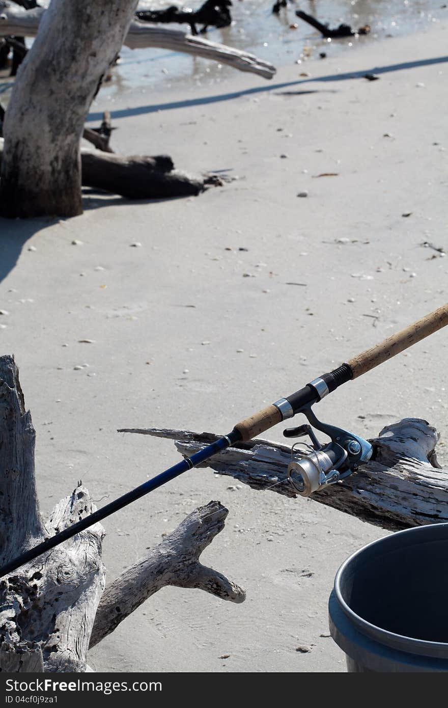 A rod and reel set out to begin the day's fishing expedition