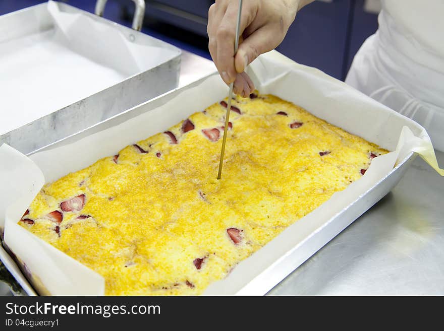 Checking if this baked pastry pie baking just. Checking if this baked pastry pie baking just