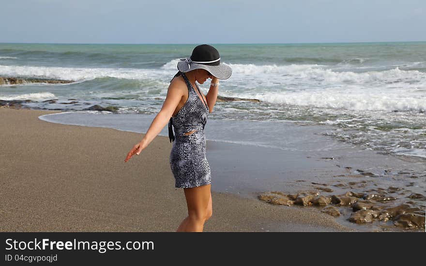 Beauty woman silhouette over sea horizon. Beauty woman silhouette over sea horizon