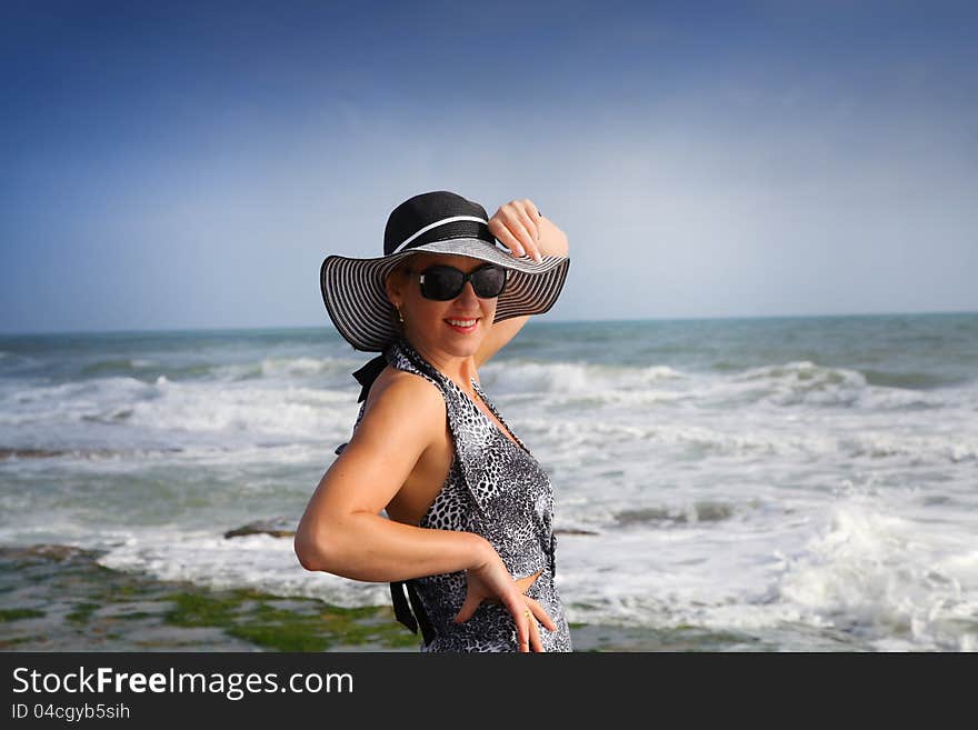 Woman on the sea shore