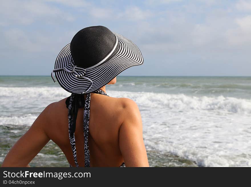 Beauty woman silhouette over sea horizon. Beauty woman silhouette over sea horizon