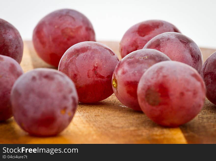 Grapes on a wooden board