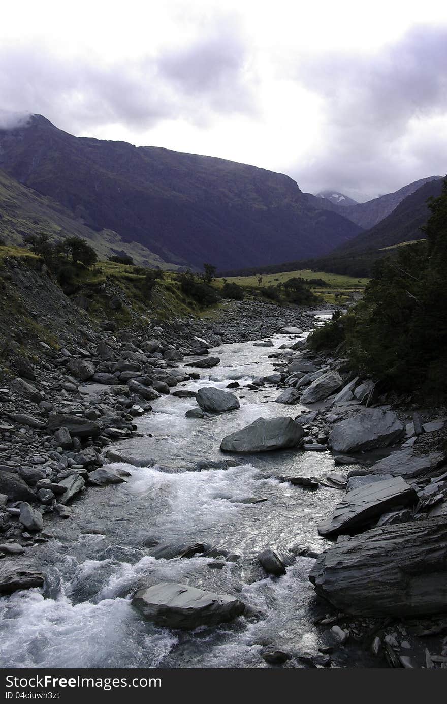 River in the south of New Zealand comming from the mountains and fed from a glacier. River in the south of New Zealand comming from the mountains and fed from a glacier