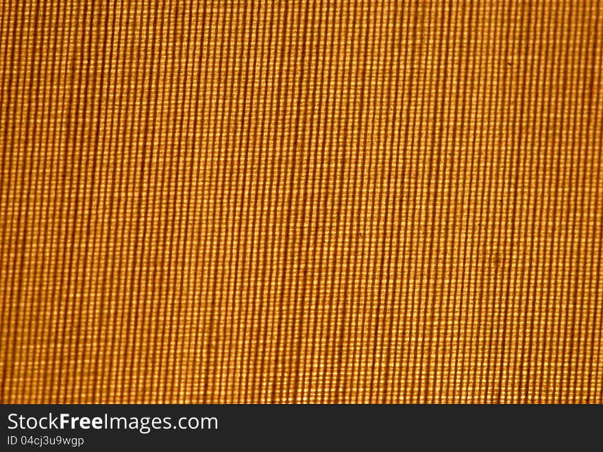 Closup of a cross weave background lite from behind
