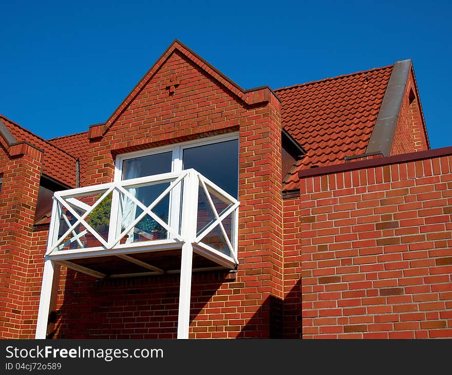 Modern design condominium apartment home made from red bricks. Modern design condominium apartment home made from red bricks