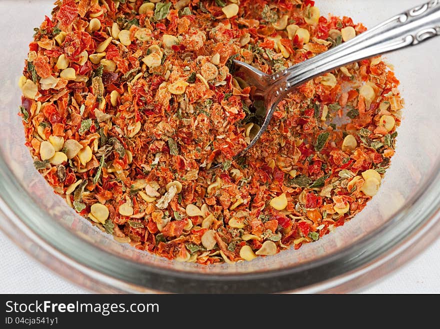 Hot pepper flakes in a bowl. Hot pepper flakes in a bowl