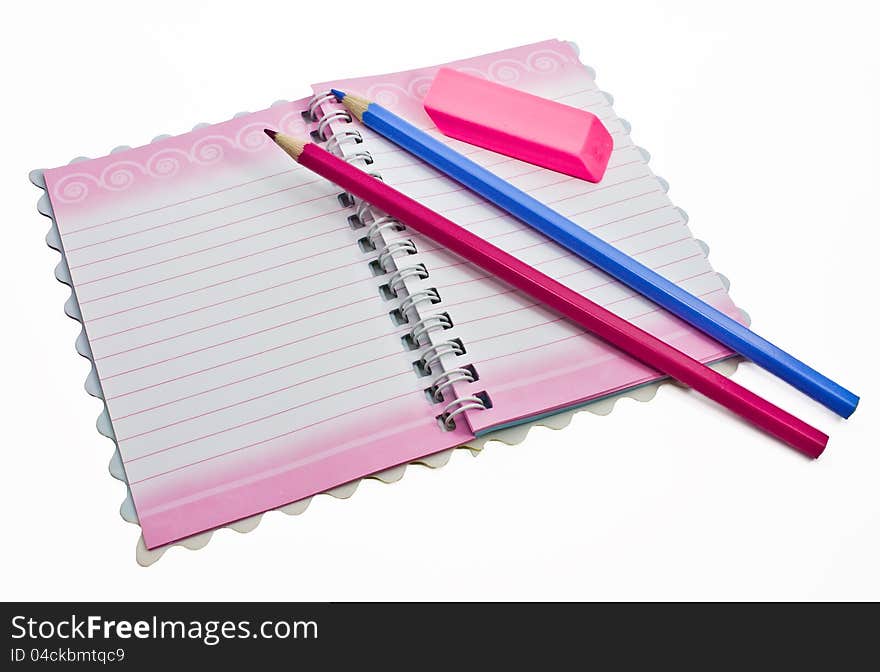 A pencil eraser, a notebook