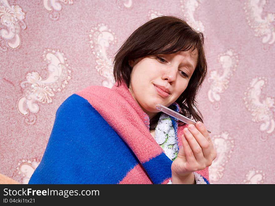 Sick Girl Thermometer In A Bathrobe