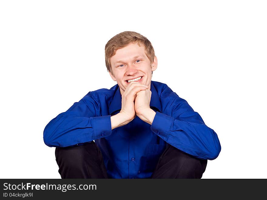 The guy sitting on a chair isolated