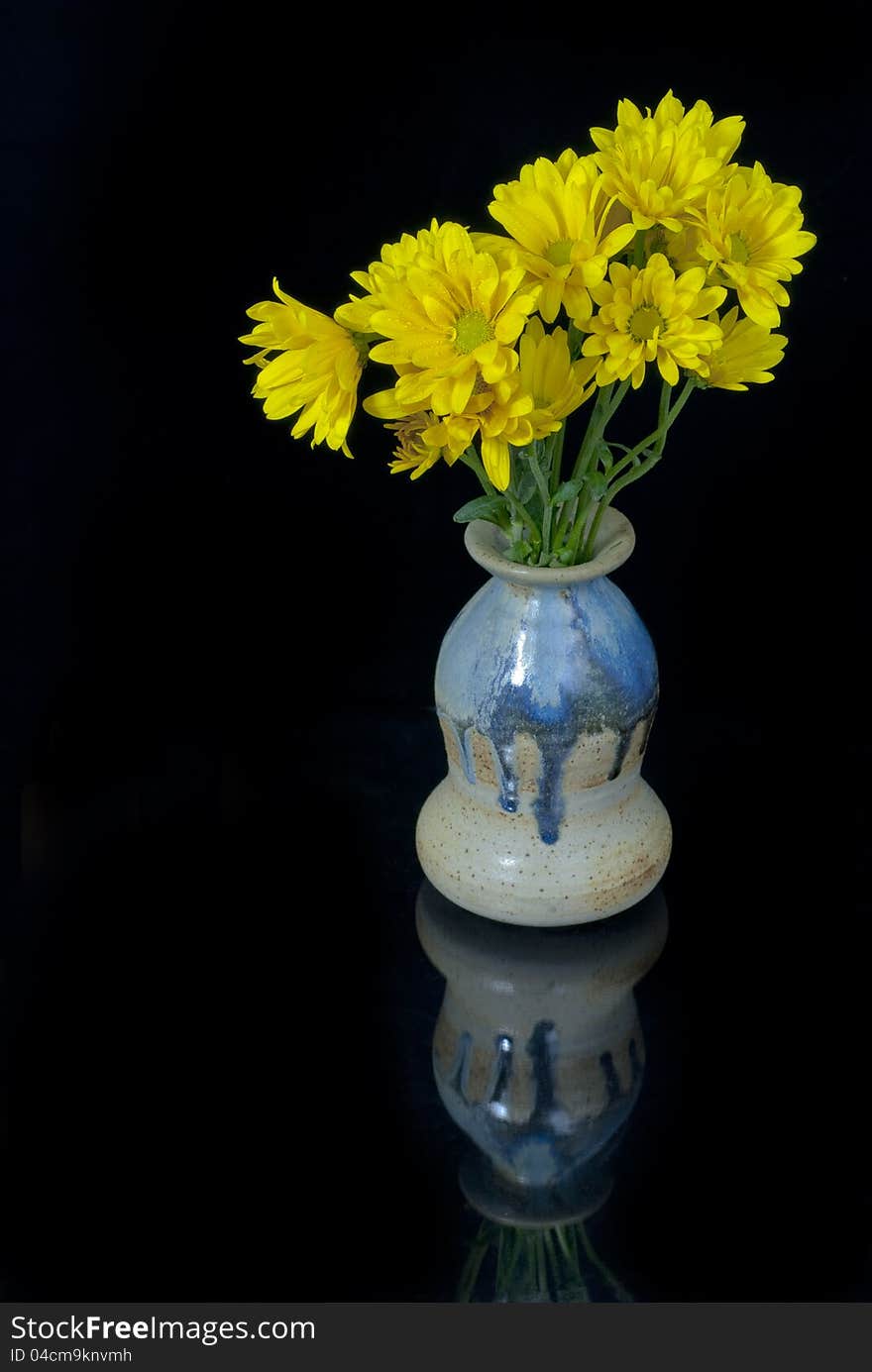 Yellow Daises In A Vase