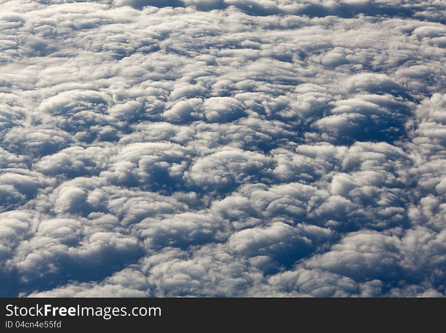 Background texture from clouds seen out of an airplane window. Background texture from clouds seen out of an airplane window