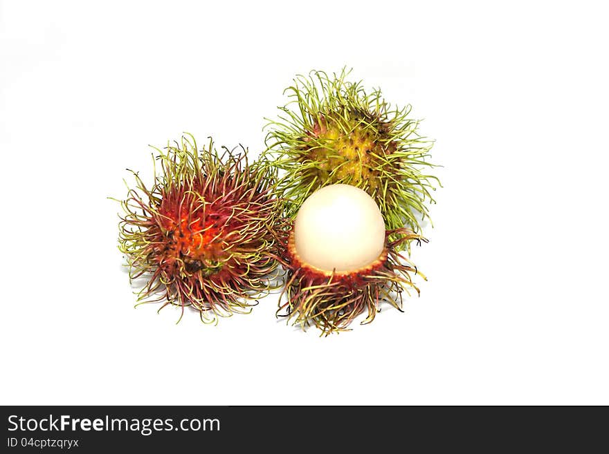 Three rambutan on white background .