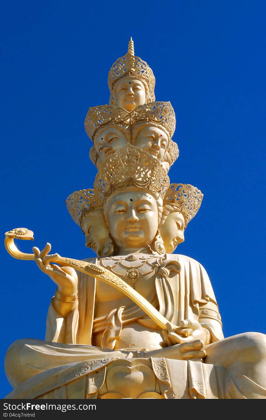 The faces of Golden Buddha of Emei