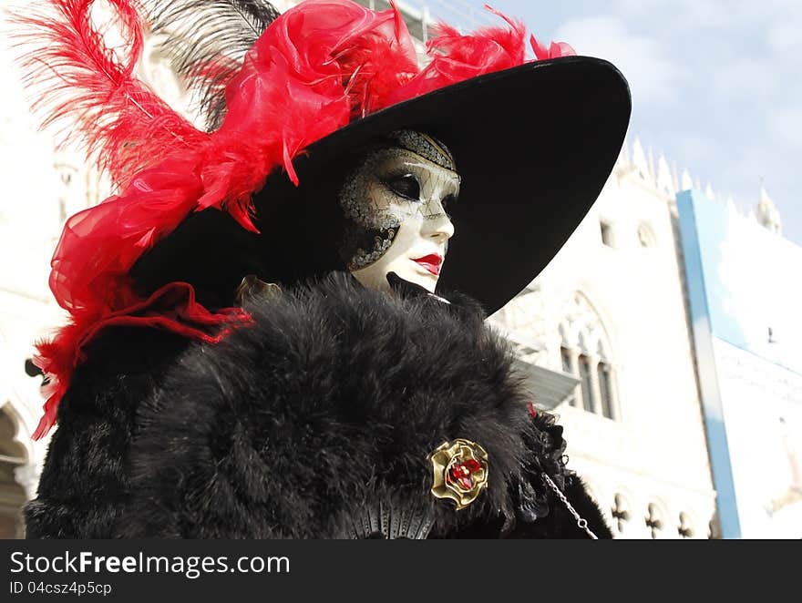 Mask of woman posing in st.mark square venice. Mask of woman posing in st.mark square venice