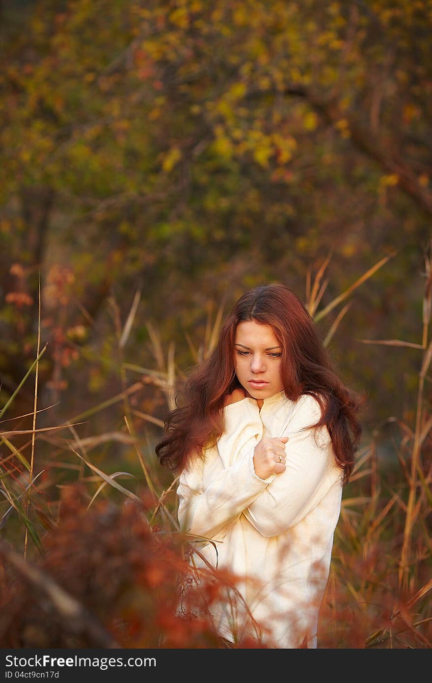 Girl having a rest on nature in autumn. Girl having a rest on nature in autumn