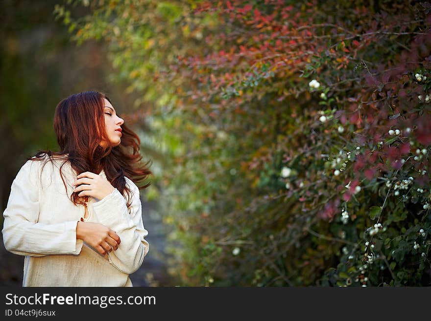 Girl having a rest on nature in autumn. Girl having a rest on nature in autumn