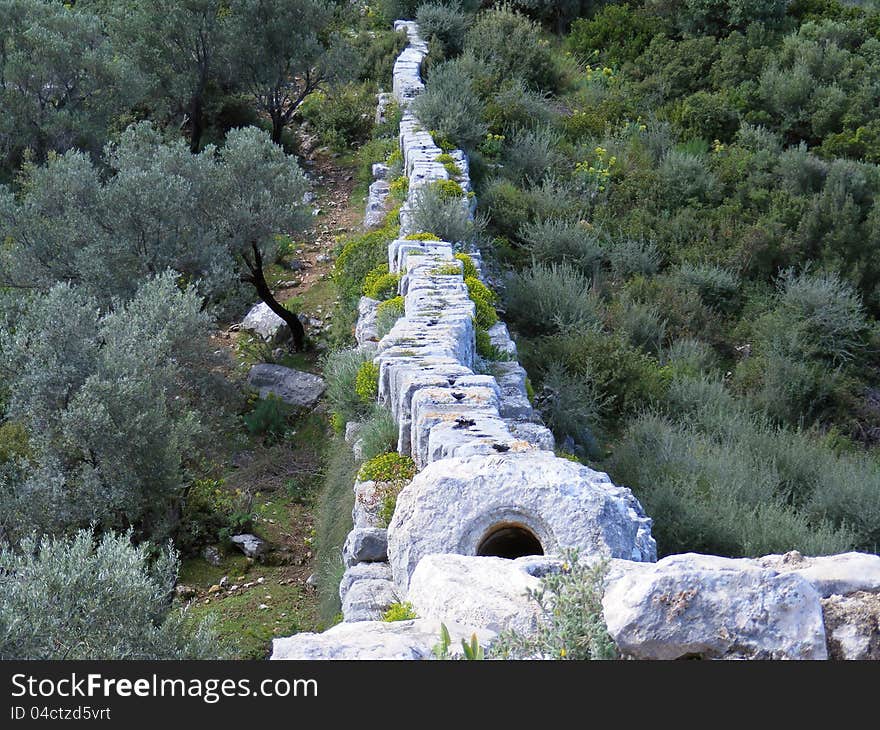 Shows walls and top of the Roman Aquaduct on the Lycian Way near Patara, Turkey. Shows walls and top of the Roman Aquaduct on the Lycian Way near Patara, Turkey