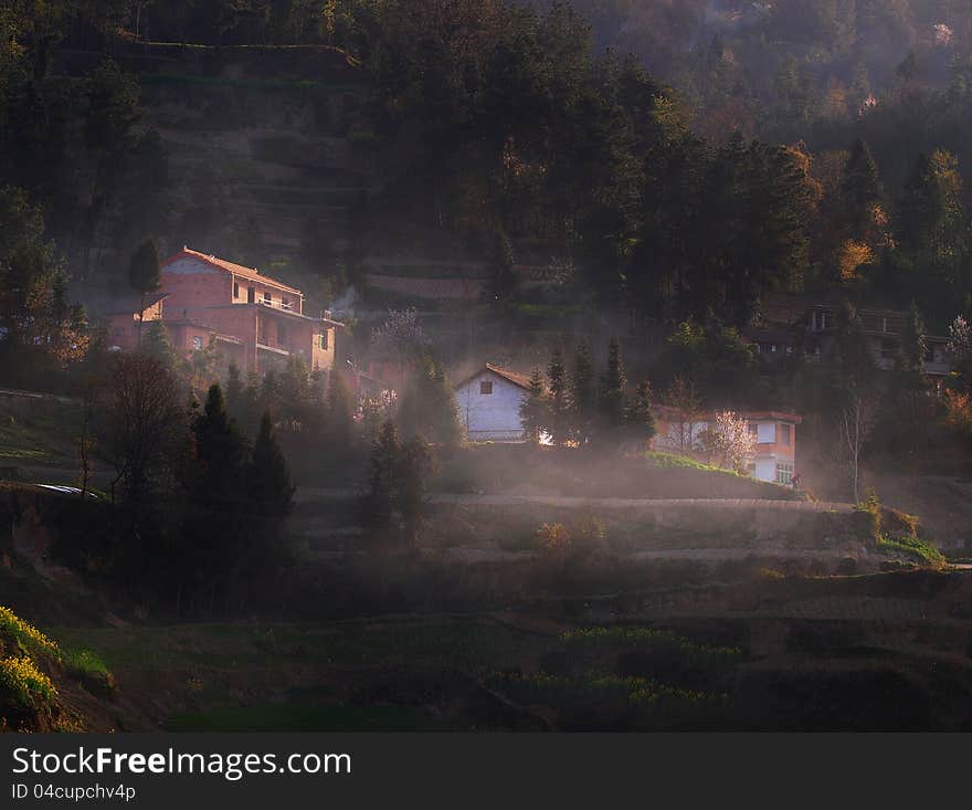 A bundle of bright sunlight on a high mountain in the farmhouse, in April 2012, in hanzhong city in shaanxi rural shooting. A bundle of bright sunlight on a high mountain in the farmhouse, in April 2012, in hanzhong city in shaanxi rural shooting.