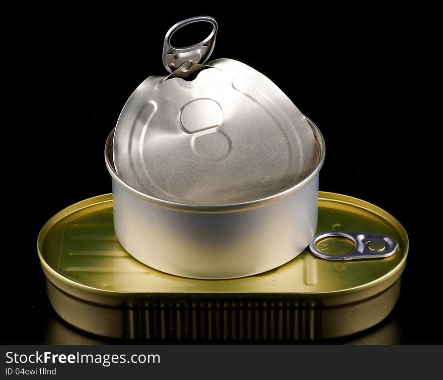 Stack of Canned Goods isolated on black background