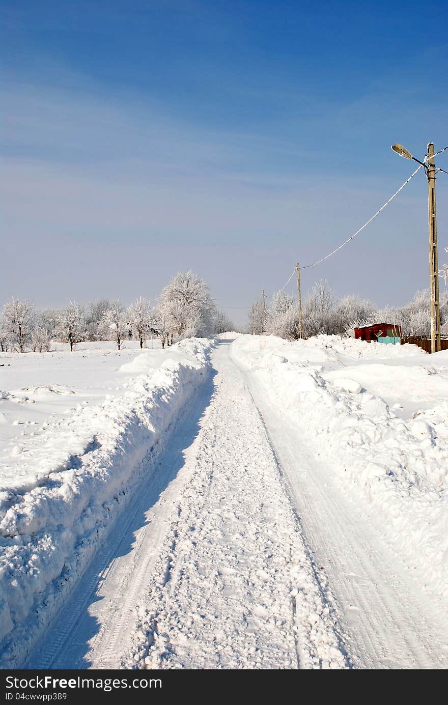 Image of a countryside road in winter. Image of a countryside road in winter