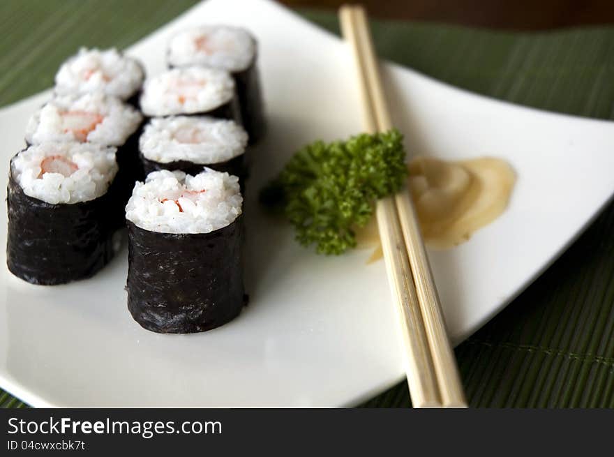 Close up sushi set on white plate