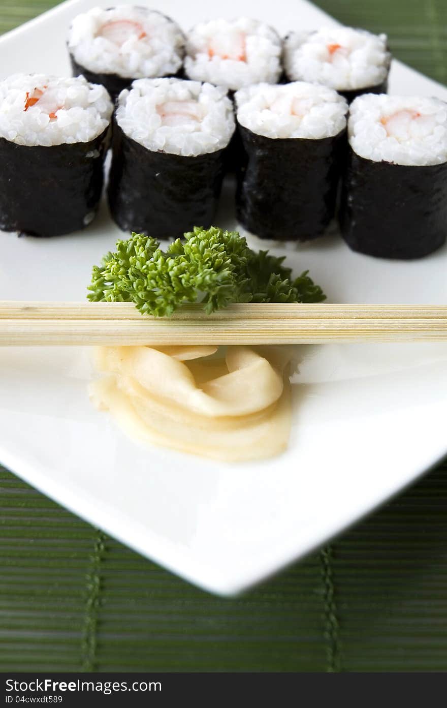 Close up sushi on white plate