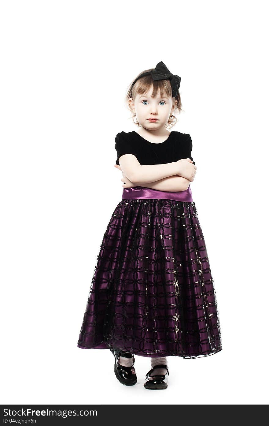 Little cute girl in a dark dress. Little cute girl in a dark dress