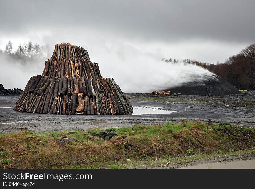 Charcoal pile in the outdoors, Transylvania, Romania