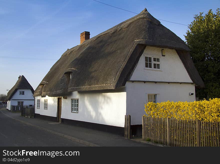 Traditional homes in late evening sunshine in small village. Traditional homes in late evening sunshine in small village