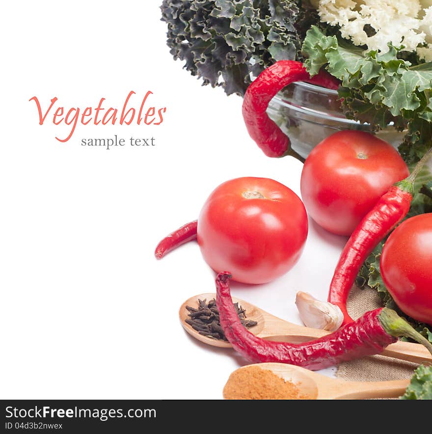 Spices and vegetables on white background