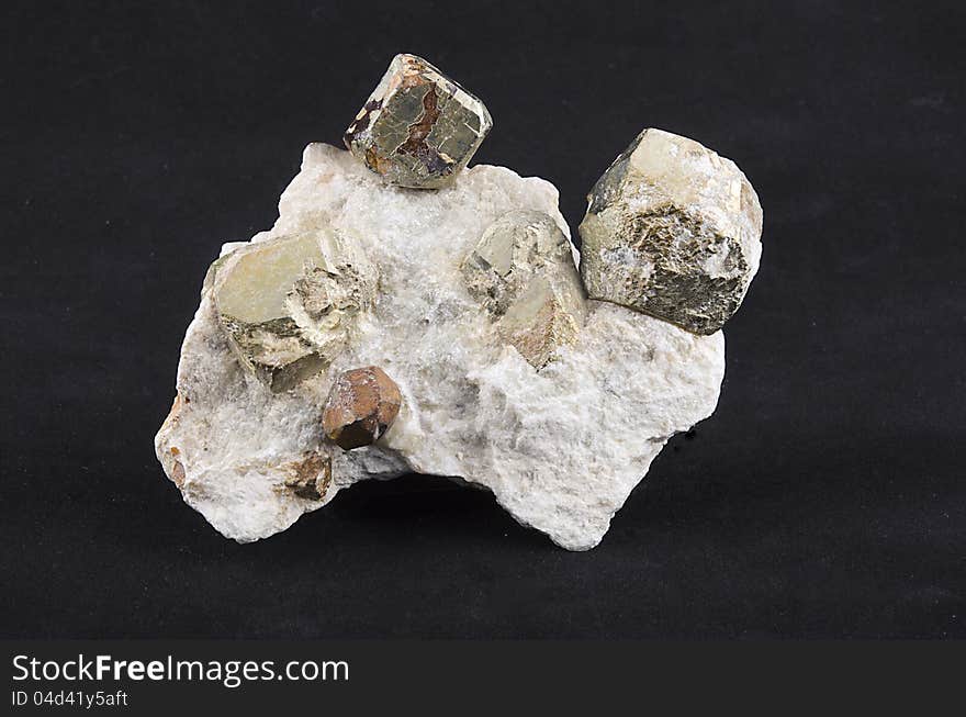 Natural pyrite crystal octahedral mine in Sardinia, Orani. Mineral sample on rock.